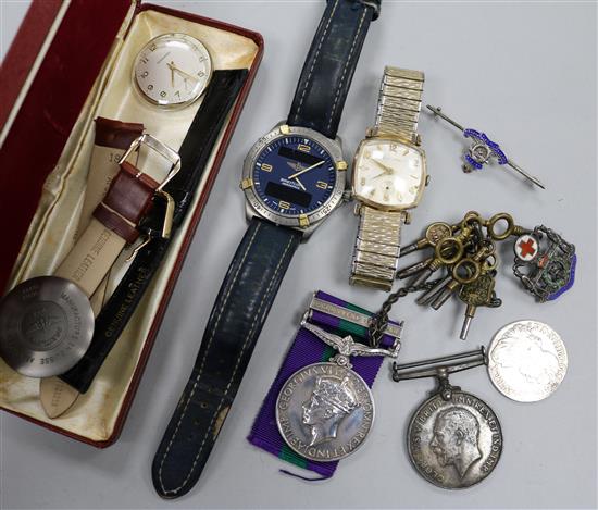 Assorted items including watches and medals etc.